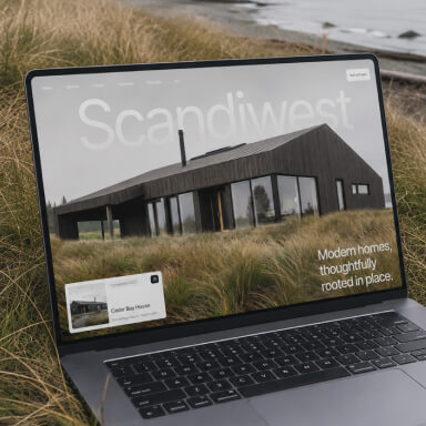 Scandiwest website shown on a laptop